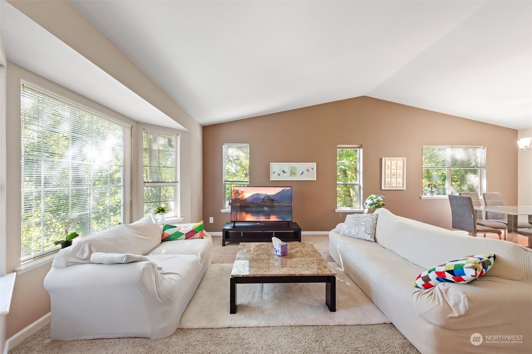 750 South 55th Street Renton, WA 98055 - Photo 12 of 31 a living room with furniture and a large window