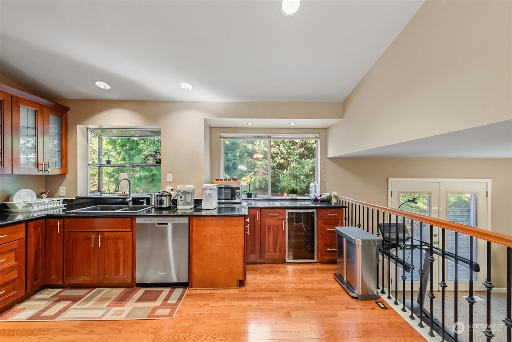 750 South 55th Street Renton, WA 98055 - Photo 7 of 31 a kitchen with stainless steel appliances granite countertop sink stove and window