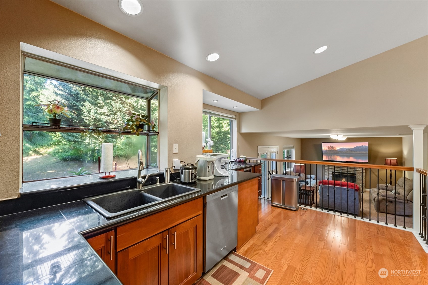 750 South 55th Street Renton, WA 98055 - Photo 10 of 31 a kitchen with lots of counter top space and stainless steel appliances