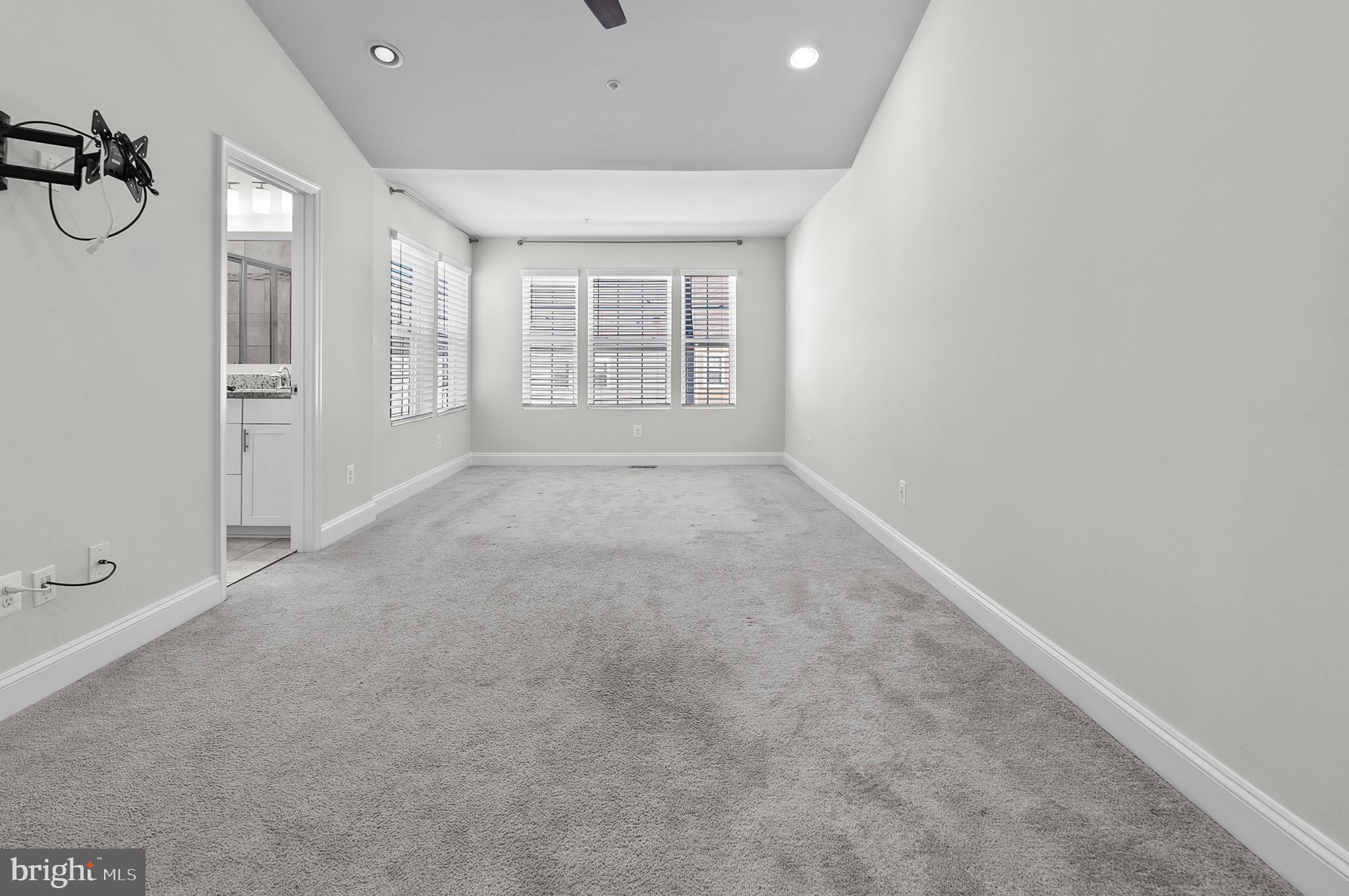 534 Calvert Way Aberdeen, MD 21001 - Photo 12 of 26 wooden floor in an empty room with a window