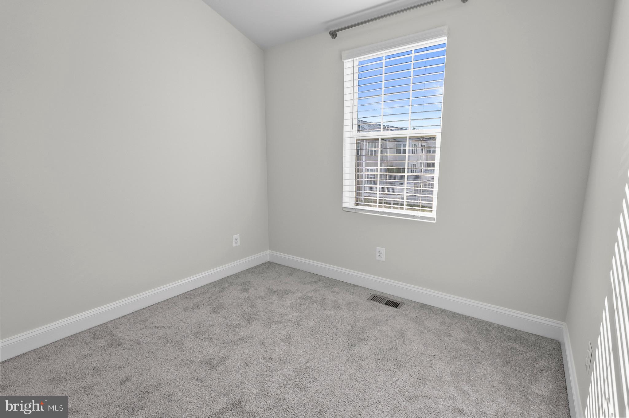 534 Calvert Way Aberdeen, MD 21001 - Photo 16 of 26 an empty room with a window