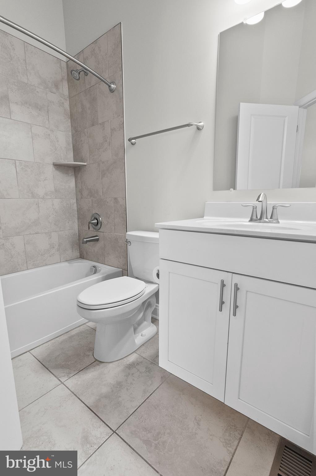 534 Calvert Way Aberdeen, MD 21001 - Photo 17 of 26 a bathroom with a toilet sink and shower