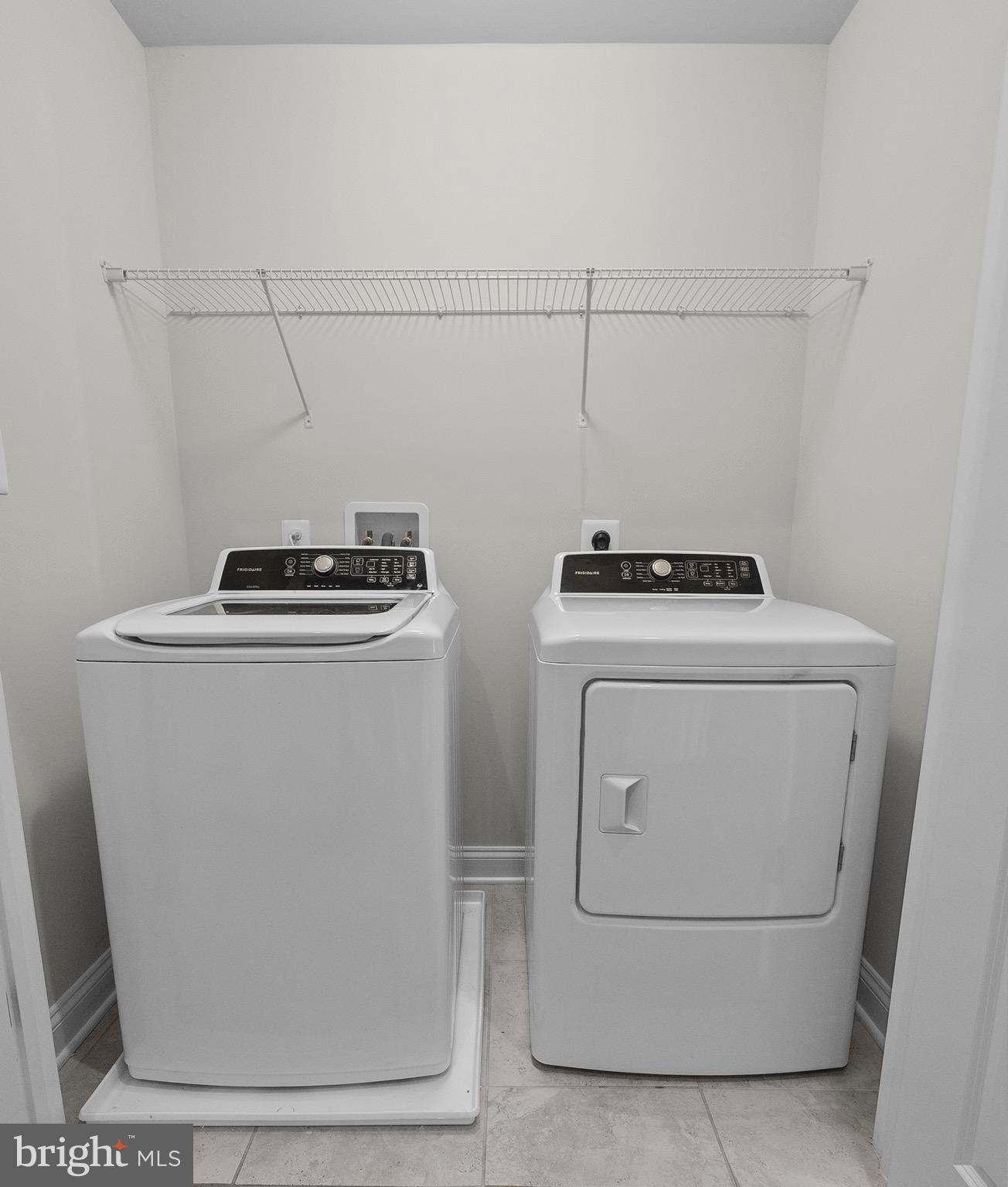534 Calvert Way Aberdeen, MD 21001 - Photo 18 of 26 a utility room with dryer and washer