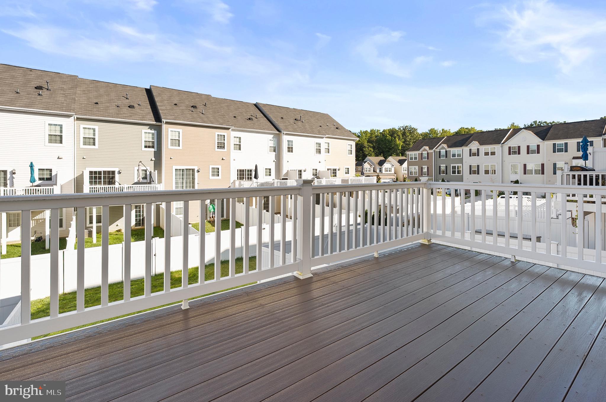 534 Calvert Way Aberdeen, MD 21001 - Photo 19 of 26 a view of a balcony with wooden floor