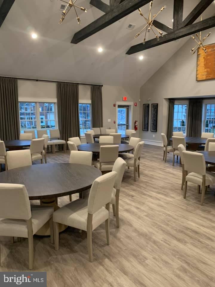 534 Calvert Way Aberdeen, MD 21001 - Photo 25 of 26 a view of a dining room with furniture window and wooden floor