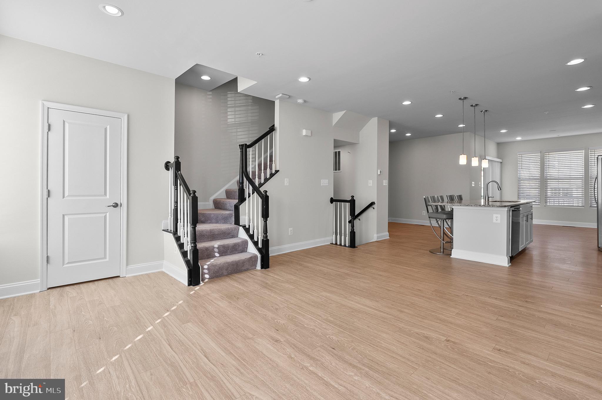 534 Calvert Way Aberdeen, MD 21001 - Photo 10 of 26 a view of a livingroom with furniture and a kitchen