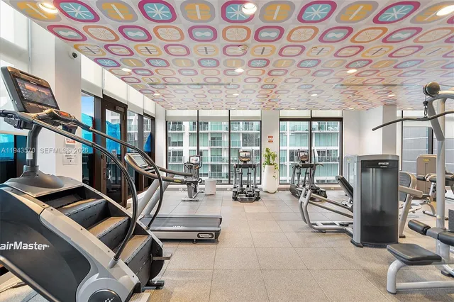 a room with lots of gym equipment