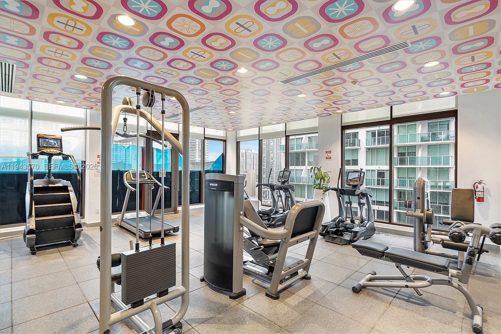 31 Southeast 6th Street, Unit 2008 Miami, FL 33131 - Photo 19 of 21 a view of a livingroom with workspace and a window