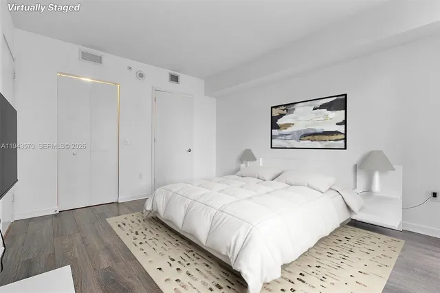 a room with a table and chairs