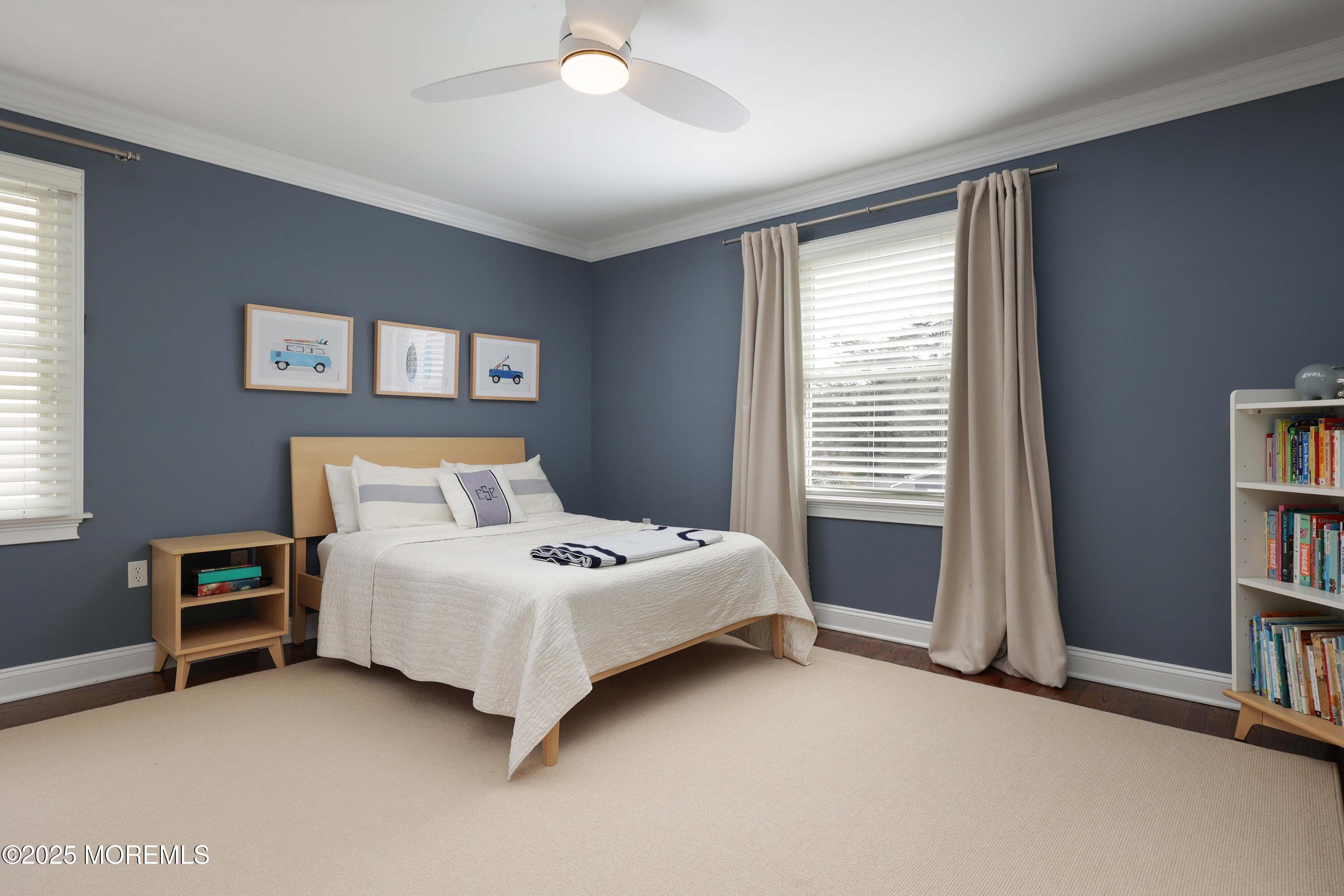 105 Black Point Road Rumson, NJ 07760 - Photo 18 of 27 a bed sitting in a bedroom next to a window