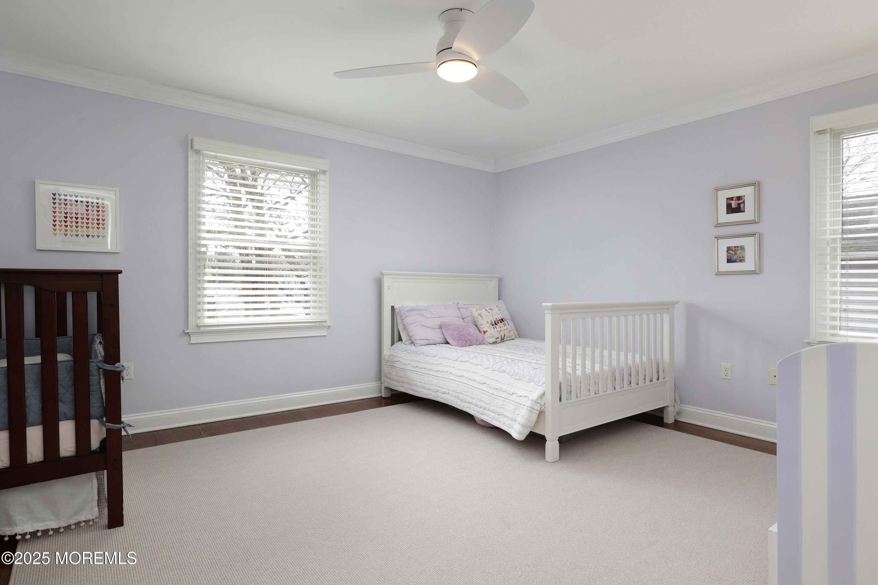 105 Black Point Road Rumson, NJ 07760 - Photo 20 of 27 a bedroom with a bed and a window
