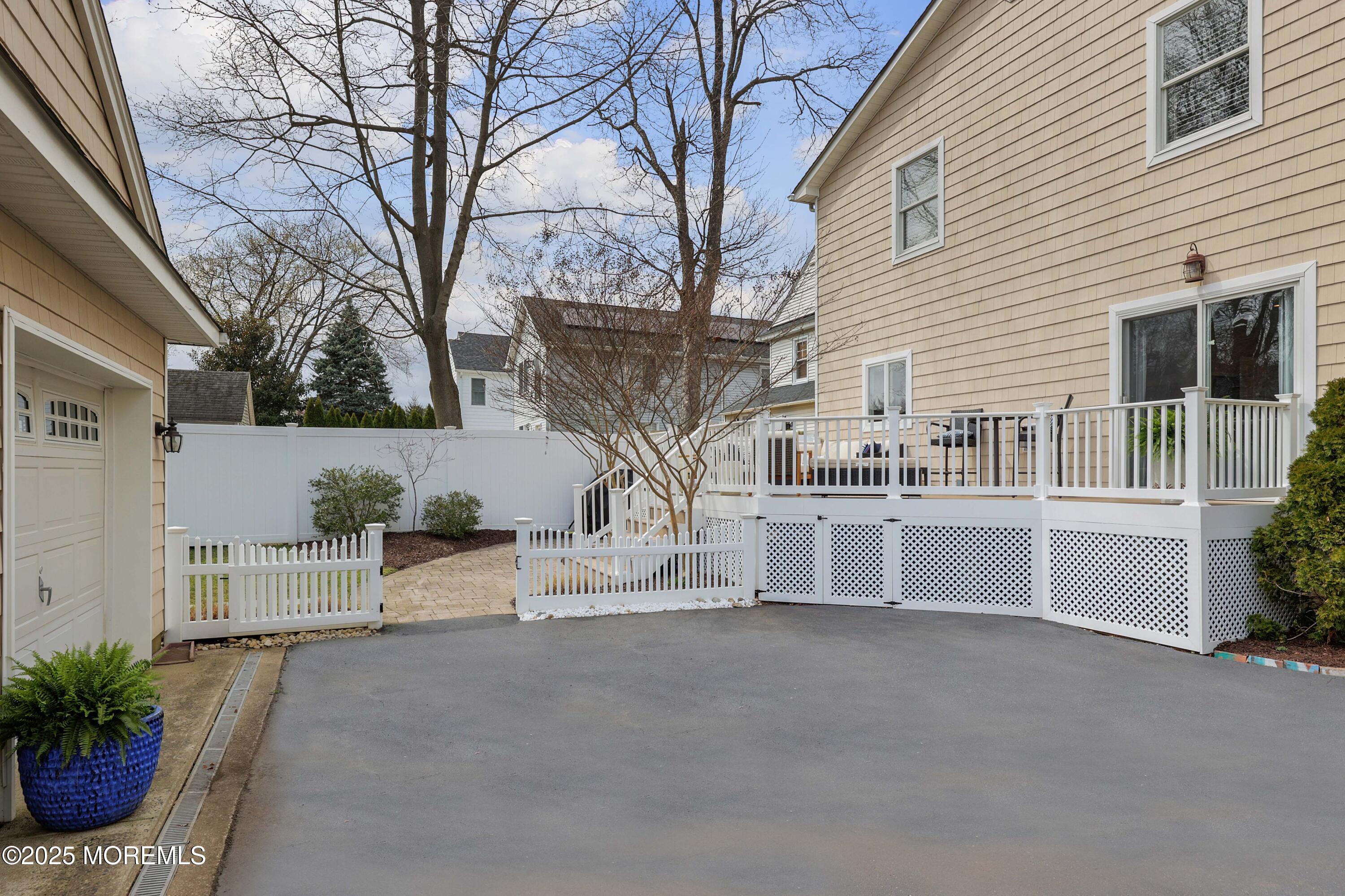 105 Black Point Road Rumson, NJ 07760 - Photo 26 of 27 a view of a house with a outdoor space