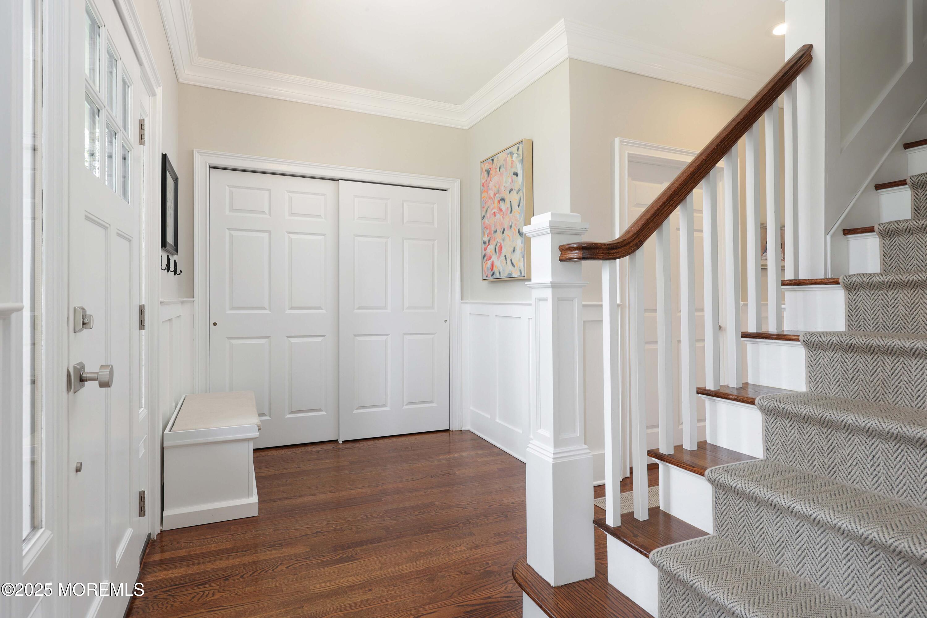 105 Black Point Road Rumson, NJ 07760 - Photo 8 of 27 a view of entryway with wooden floor and stairs