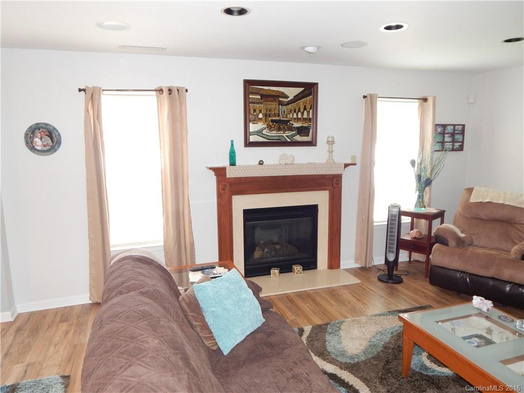 2166 Durand Road, Unit 39 Fort Mill, SC 29715 - Photo 11 of 23 a living room with furniture and a fireplace