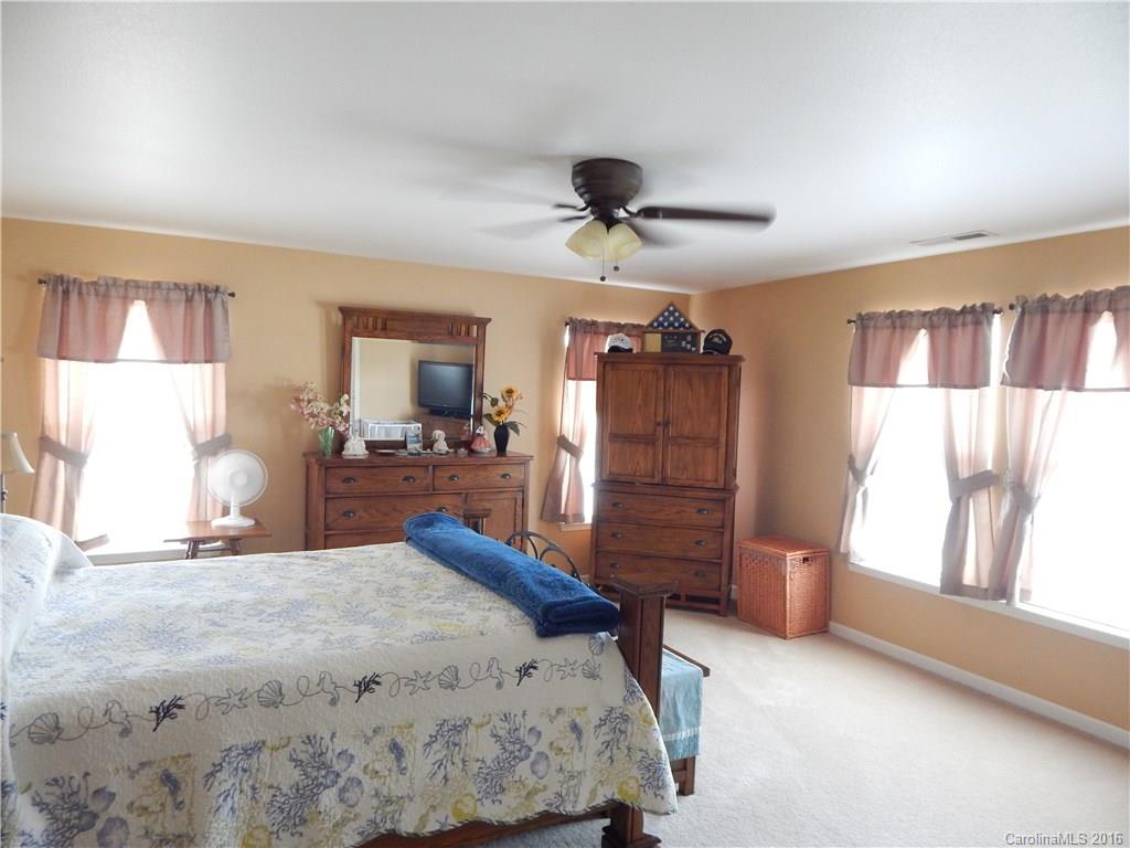 2166 Durand Road, Unit 39 Fort Mill, SC 29715 - Photo 16 of 23 a bed room with a bed and a television