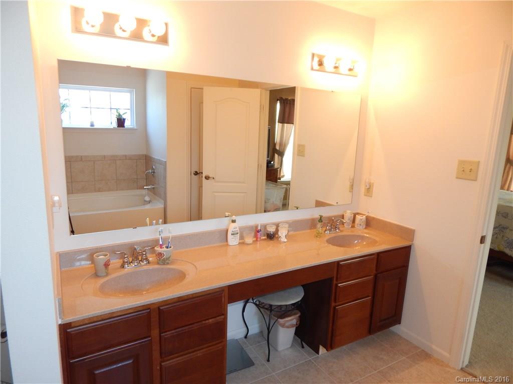 2166 Durand Road, Unit 39 Fort Mill, SC 29715 - Photo 17 of 23 a bathroom with a sink and a mirror
