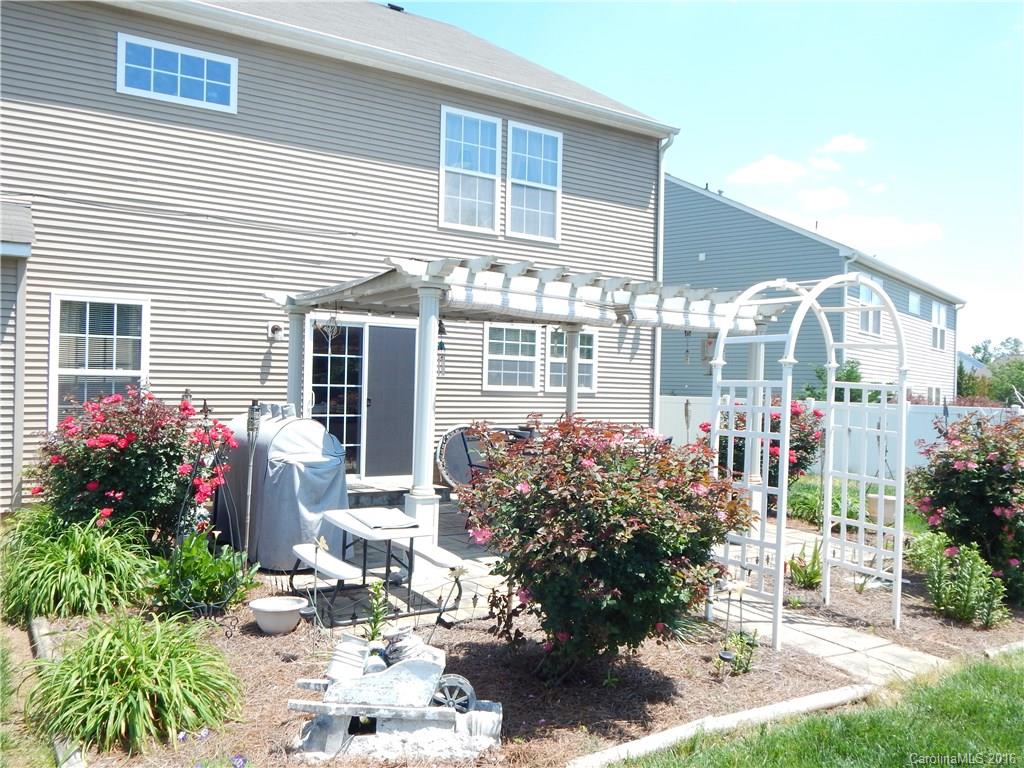 2166 Durand Road, Unit 39 Fort Mill, SC 29715 - Photo 22 of 23 a front view of a house with a garden