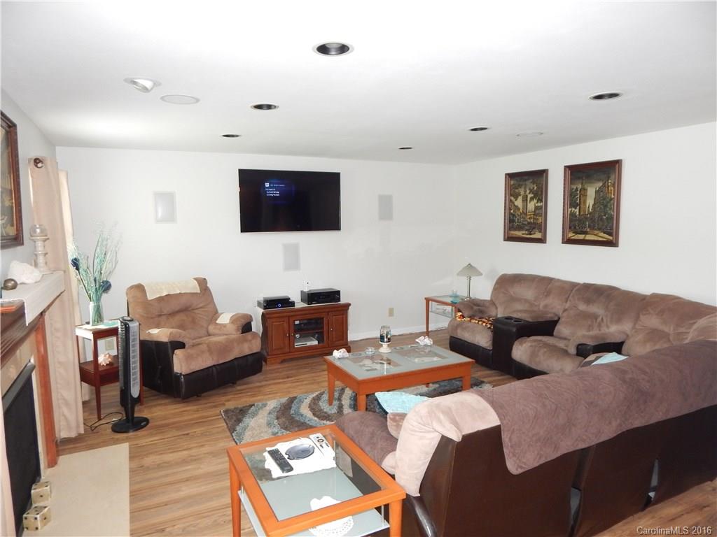 2166 Durand Road, Unit 39 Fort Mill, SC 29715 - Photo 10 of 23 a living room with furniture and a flat screen tv
