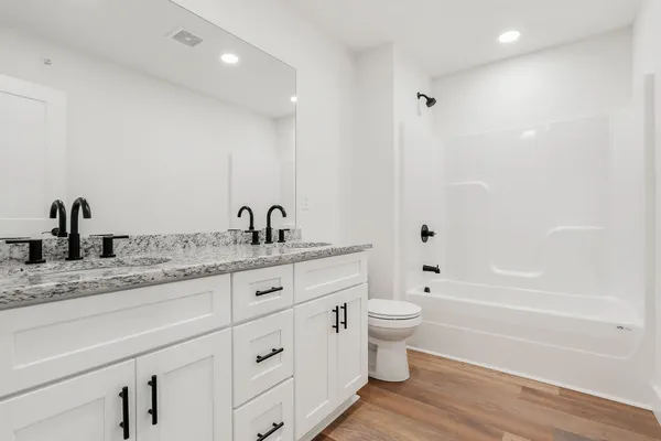 a view of a balcony with chairs