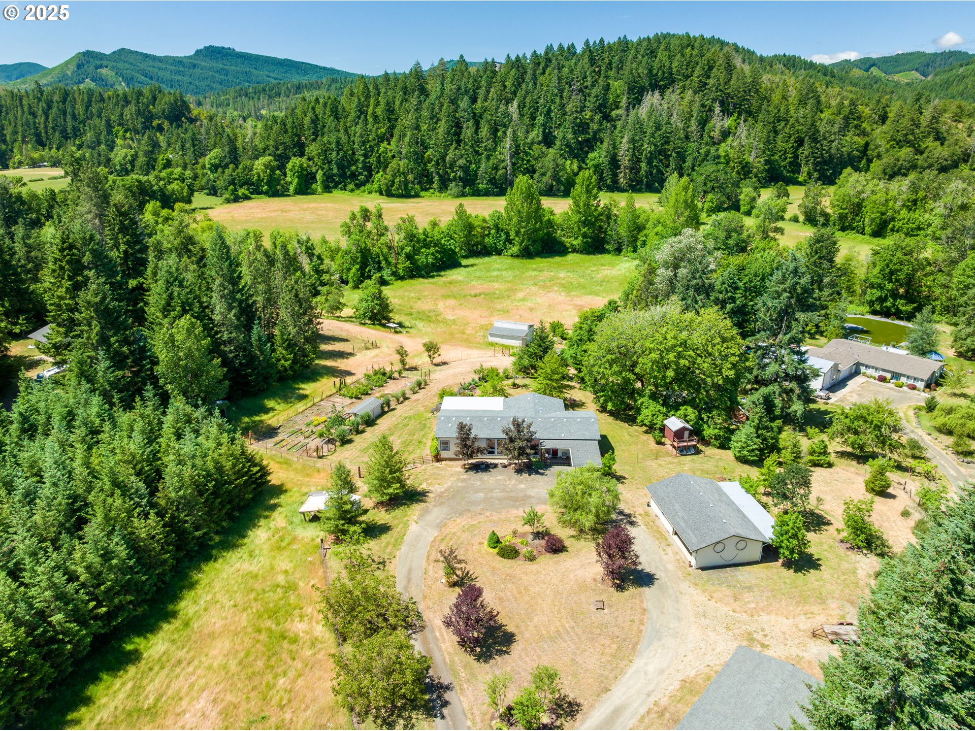 982 Reston Road Roseburg, OR 97471 - Photo 2 of 45 a view of a street with a yard