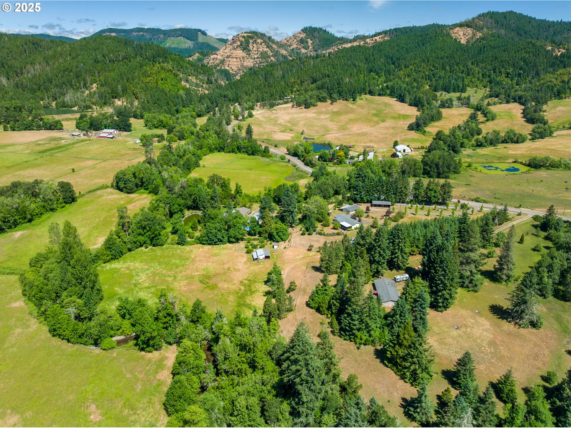 982 Reston Road Roseburg, OR 97471 - Photo 36 of 45 a view of a lake with houses