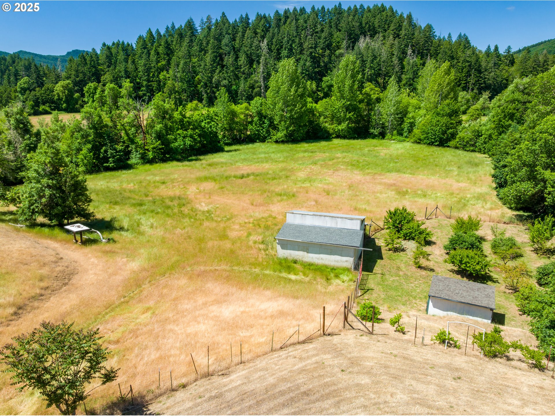 982 Reston Road Roseburg, OR 97471 - Photo 41 of 45 a view of a swimming pool with an outdoor space and seating area