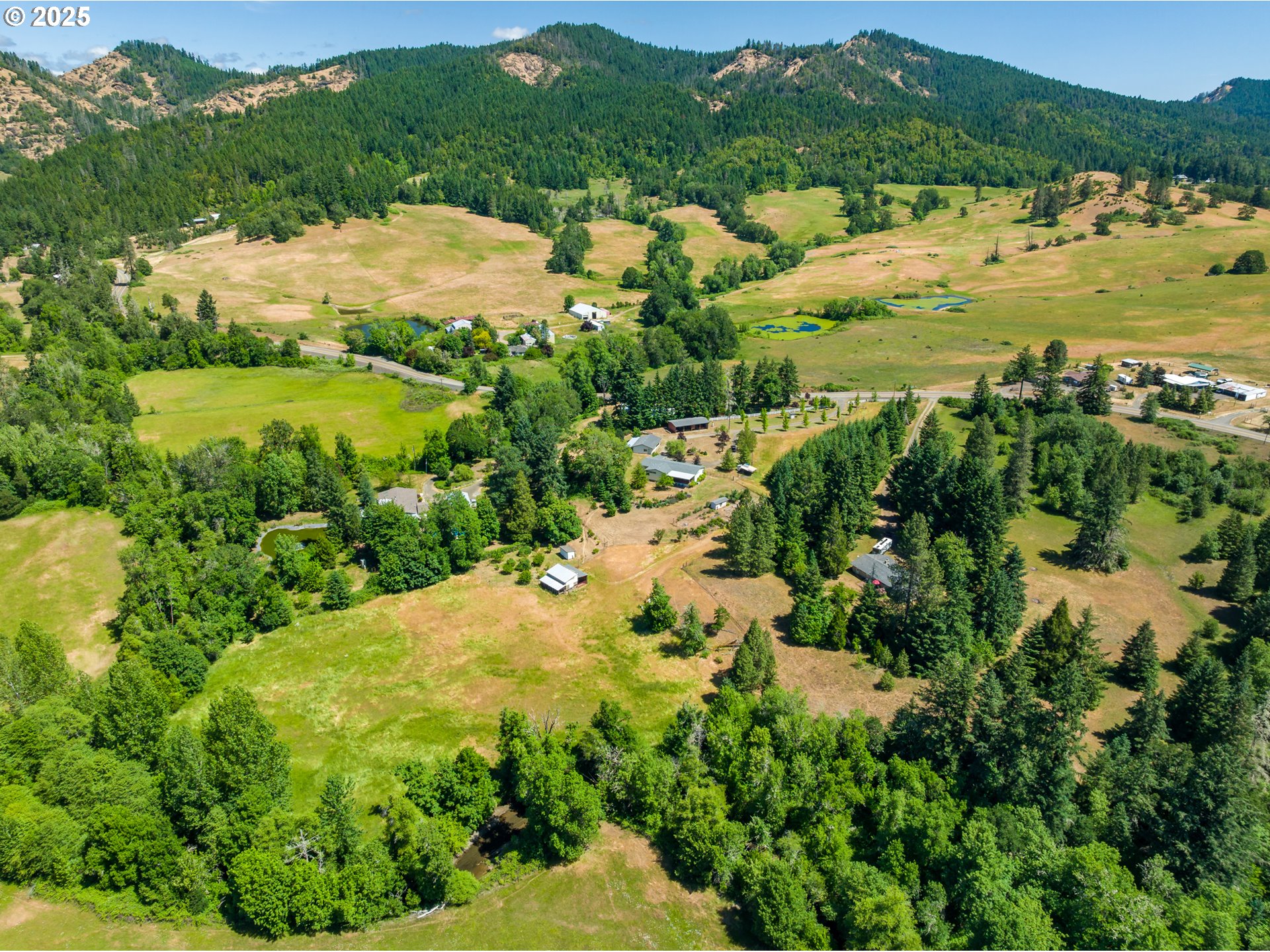 982 Reston Road Roseburg, OR 97471 - Photo 44 of 45 a view of a lake with a houses