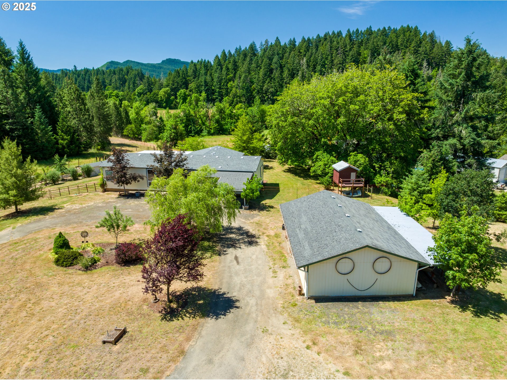 982 Reston Road Roseburg, OR 97471 - Photo 10 of 45 an aerial view of a house with garden space and street view