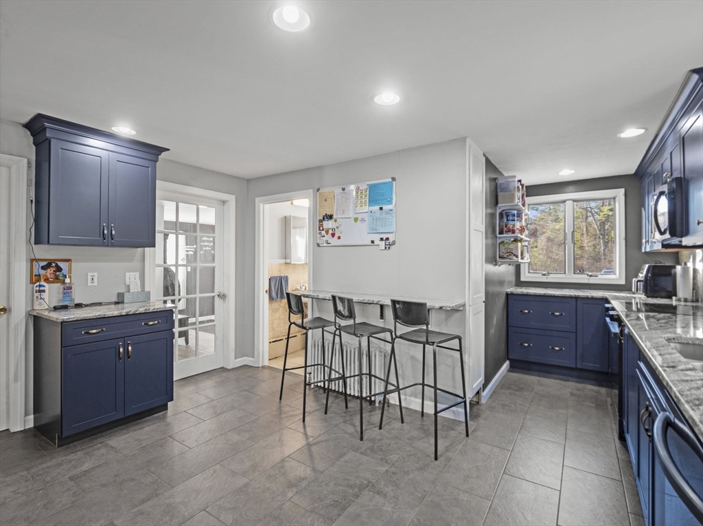 49 County Road Marion, MA 02738 - Photo 6 of 34 a living room with granite countertop furniture a sink a window and stainless steel appliances