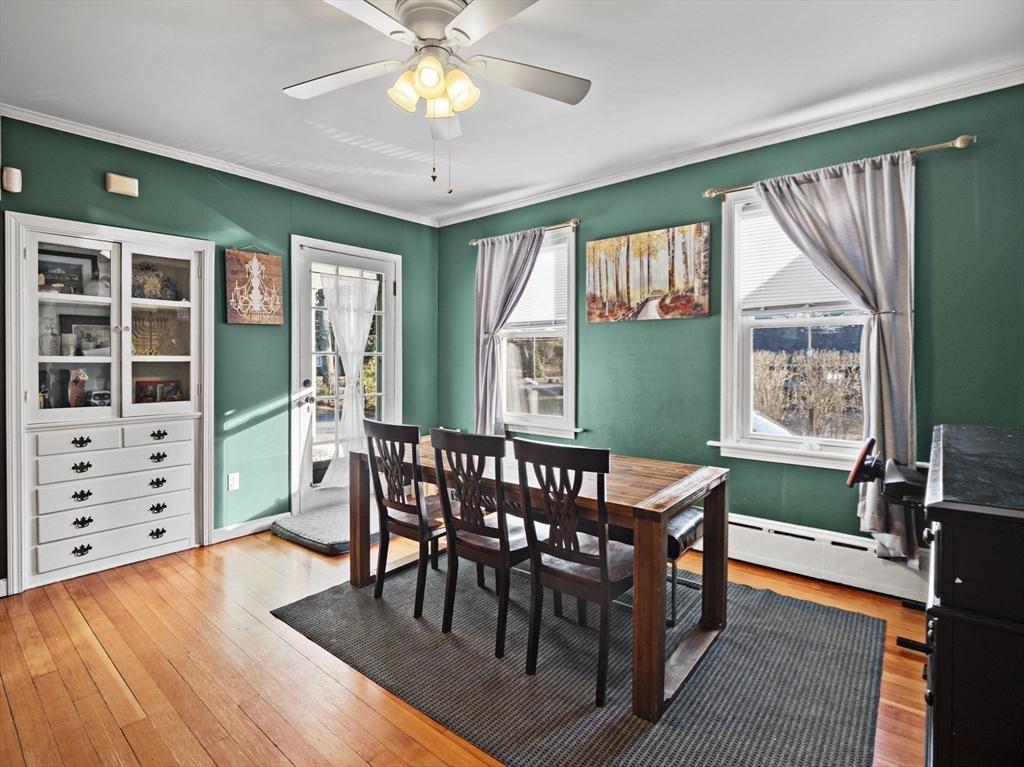 49 County Road Marion, MA 02738 - Photo 10 of 34 a view of a dining room with furniture window and wooden floor