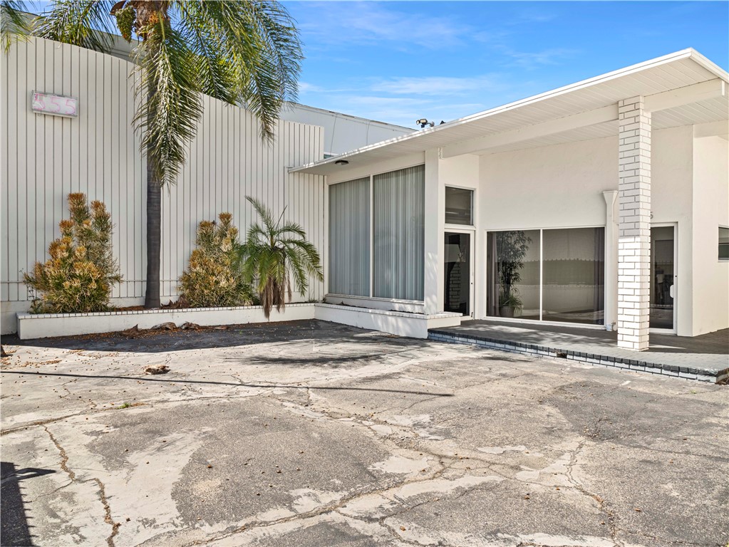 555 East 3rd Street Long Beach, CA 90802 - Photo 3 of 19 a view of a house with a garden and pathway