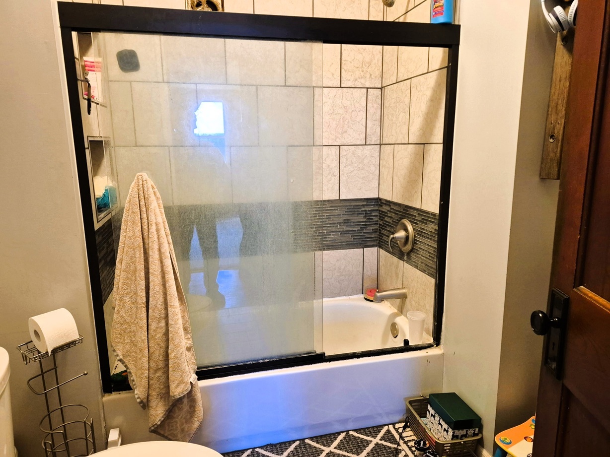 803 Madison Avenue Dixon, IL 61021 - Photo 13 of 20 a bathroom with a sink and a mirror