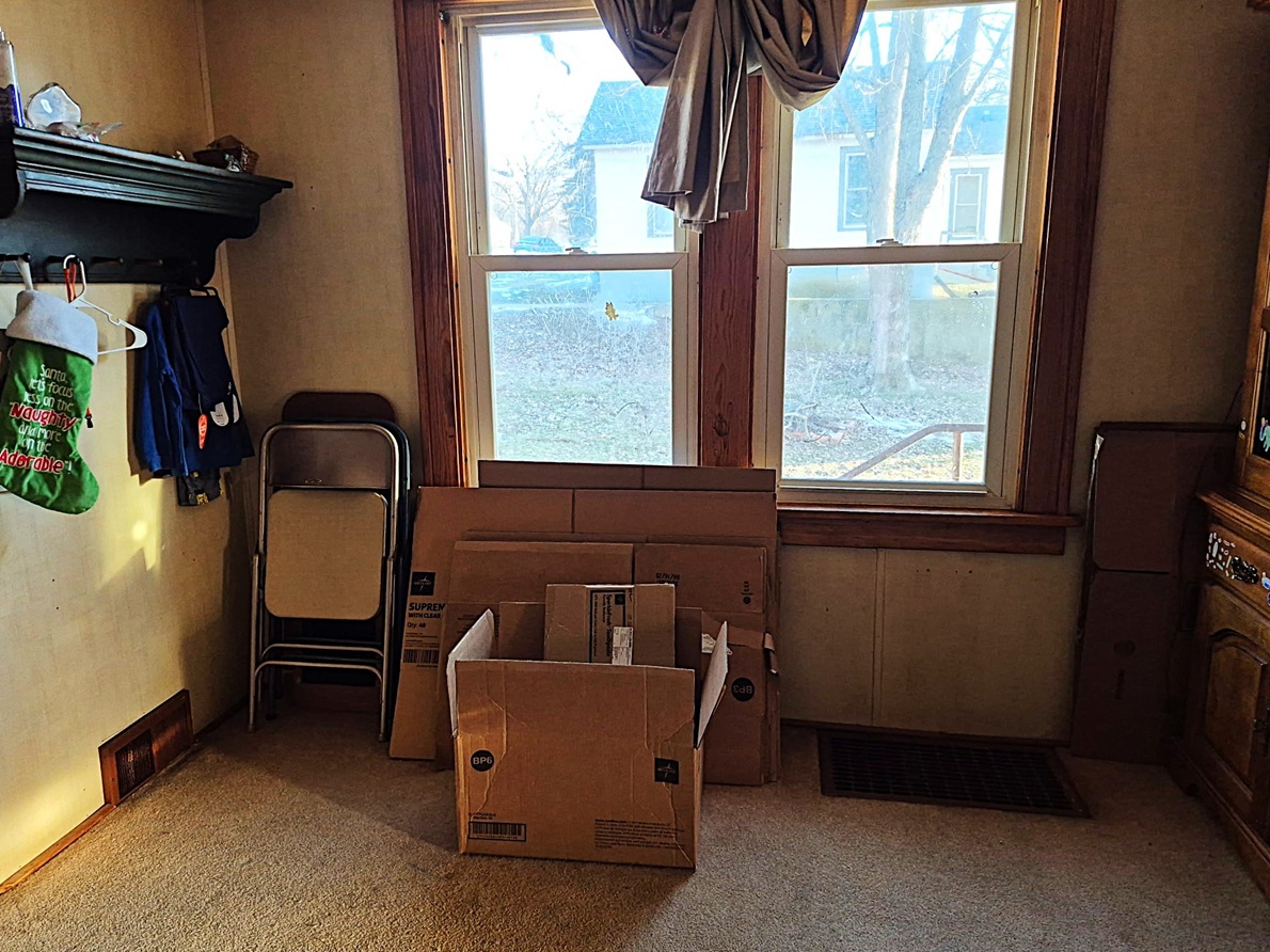 803 Madison Avenue Dixon, IL 61021 - Photo 14 of 20 a room with chairs and a window