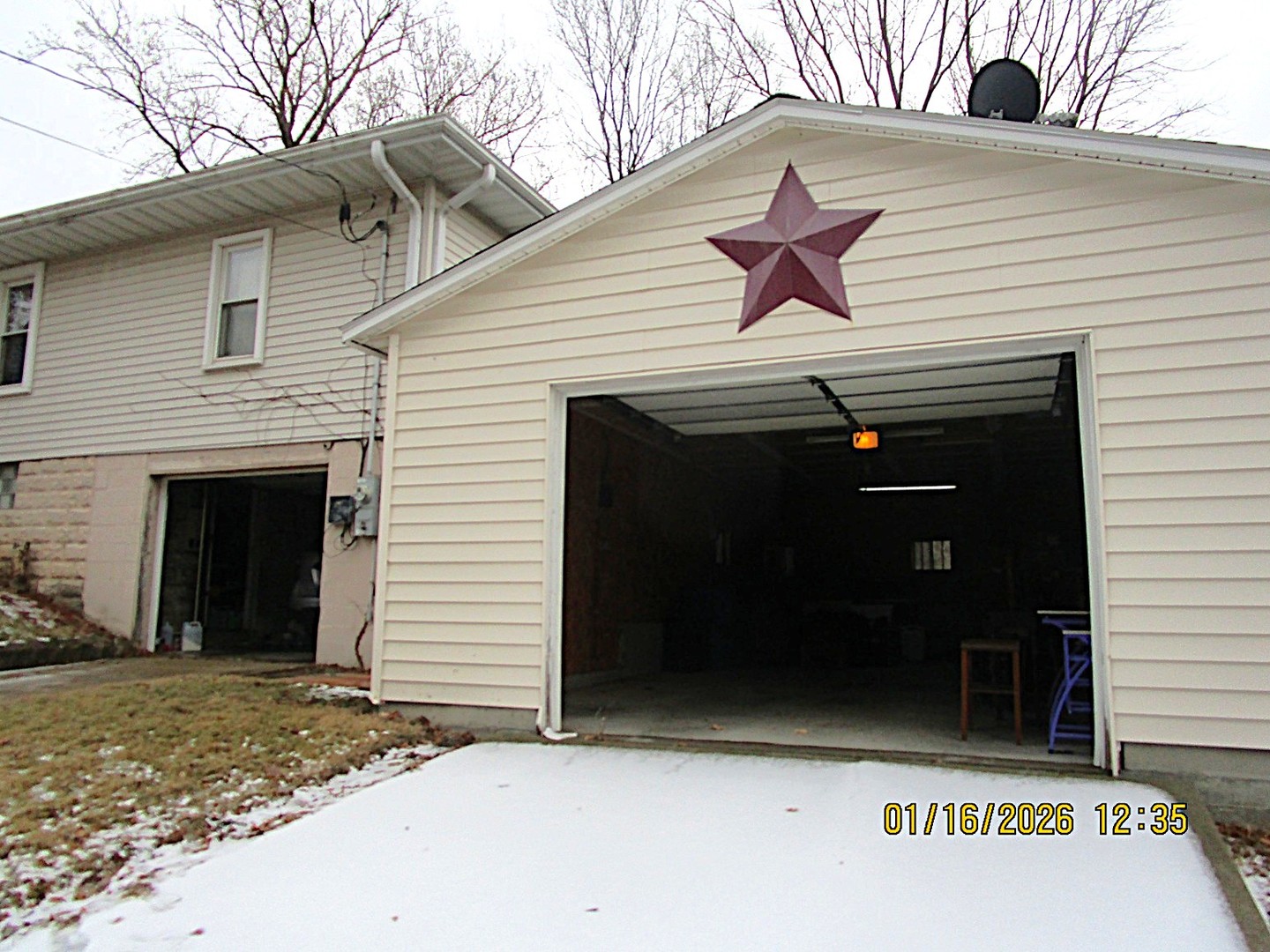 803 Madison Avenue Dixon, IL 61021 - Photo 20 of 20 a view of a house with a yard and garage