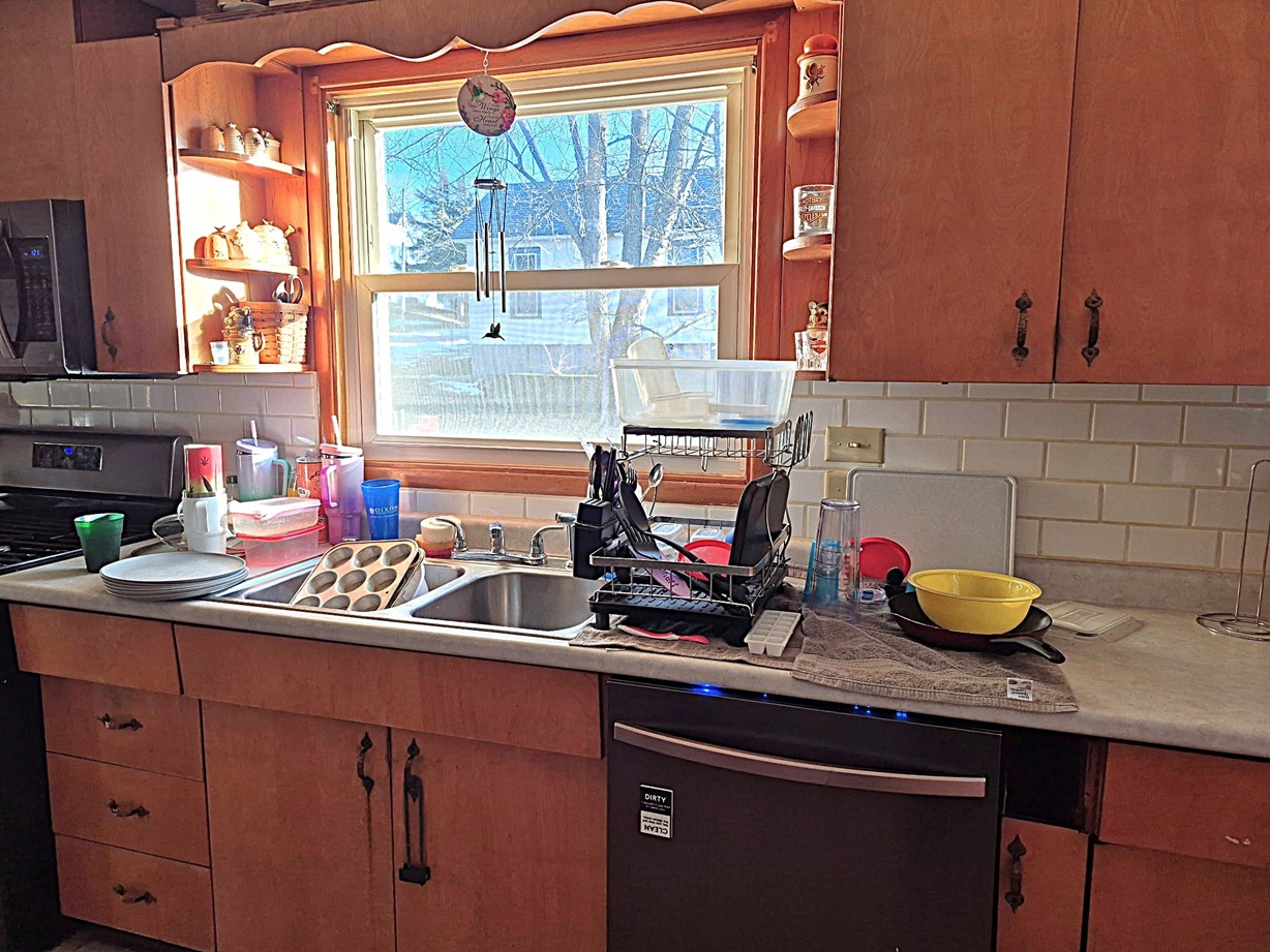 803 Madison Avenue Dixon, IL 61021 - Photo 4 of 20 a kitchen with a sink and a window