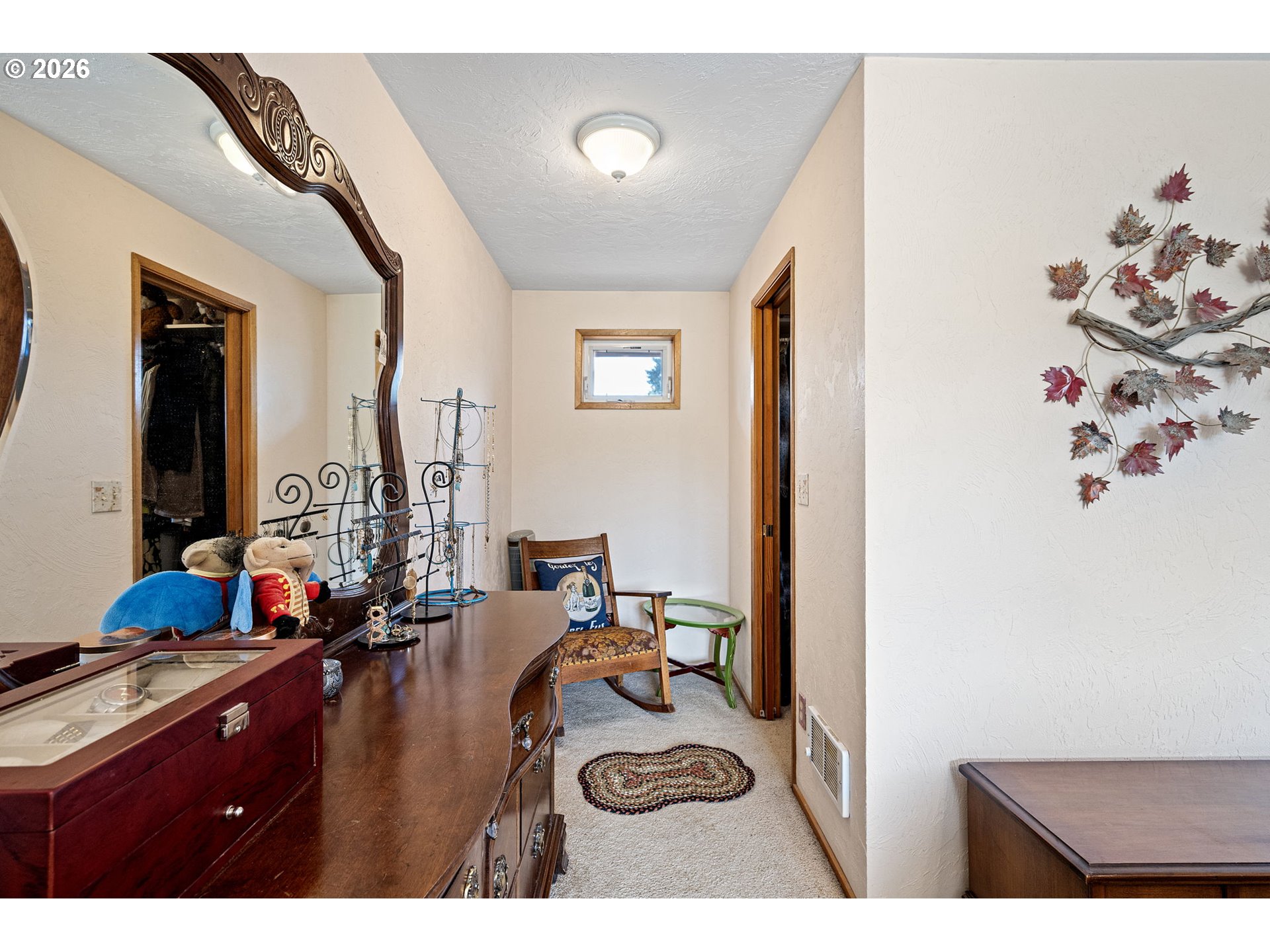 2465 17th Street Springfield, OR 97477 - Photo 31 of 47 a bedroom with furniture and a mirror
