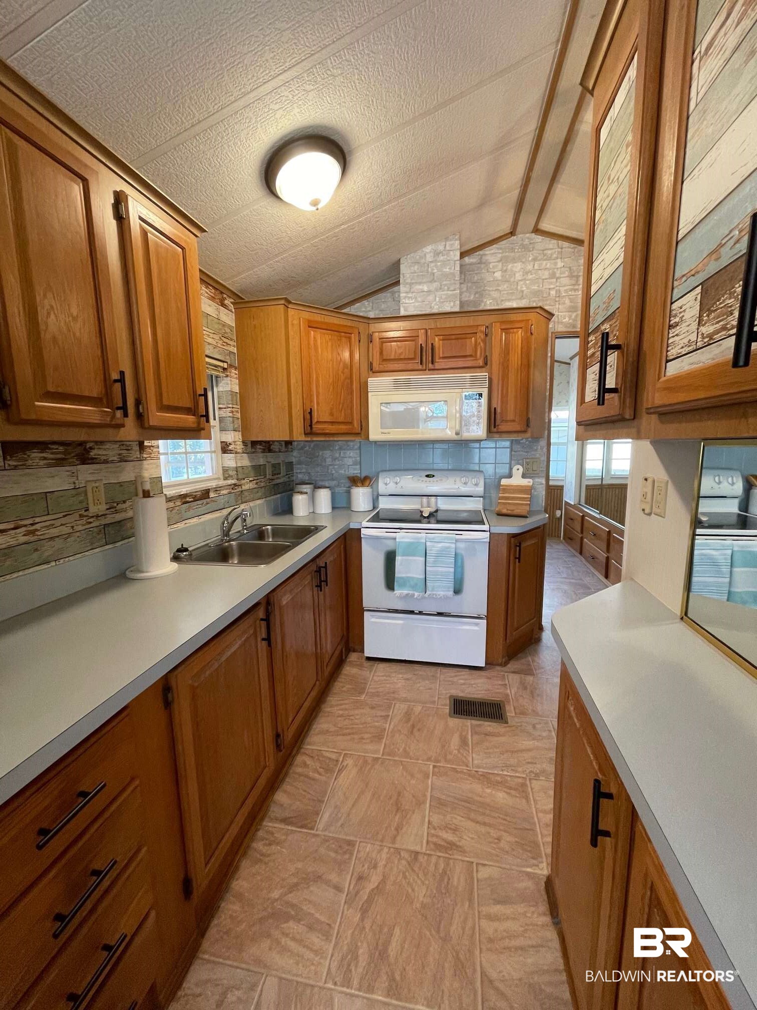 186 Defuniak Loop Lillian, AL 36549 - Photo 7 of 20 Side by side refrigerator included.
