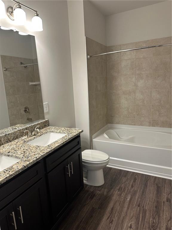 6162 Ripple Way, Unit 78 South Fulton, GA 30349 - Photo 14 of 19 a bathroom with a granite countertop sink toilet and shower