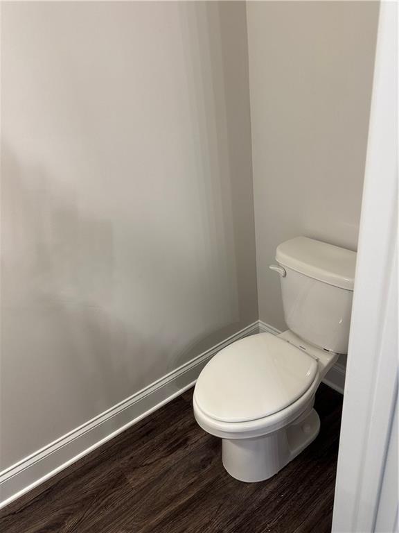 6162 Ripple Way, Unit 78 South Fulton, GA 30349 - Photo 5 of 19 a white toilet sitting next to a shower