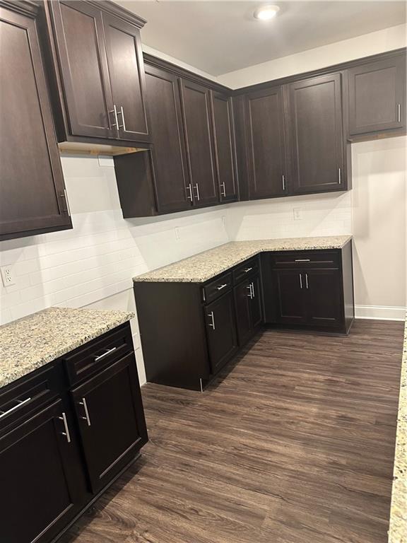 6162 Ripple Way, Unit 78 South Fulton, GA 30349 - Photo 7 of 19 a kitchen with wooden cabinets