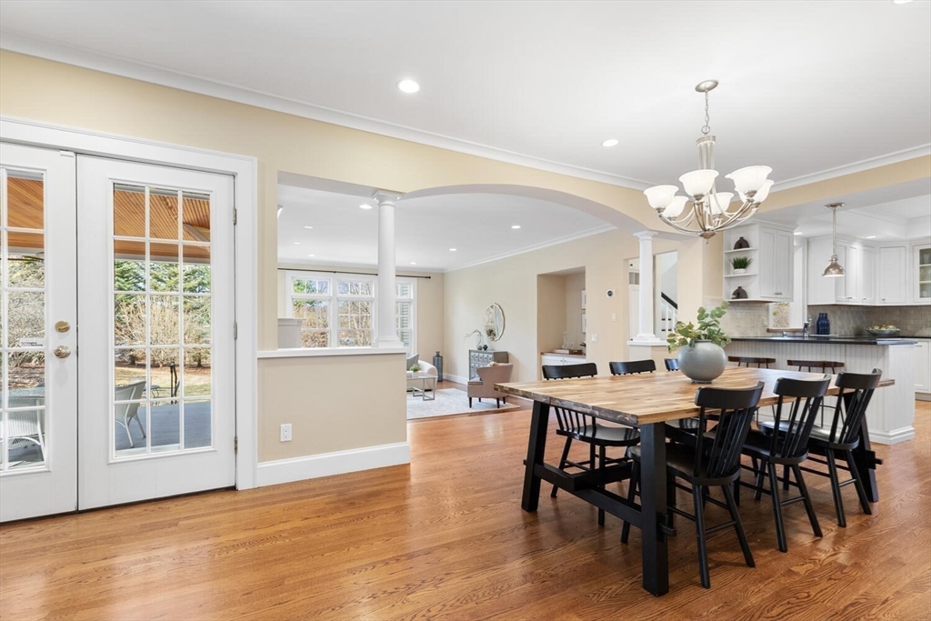 209 Waltham Street Lexington, MA 02421 - Photo 14 of 39 a view of a dining room with furniture and wooden floor