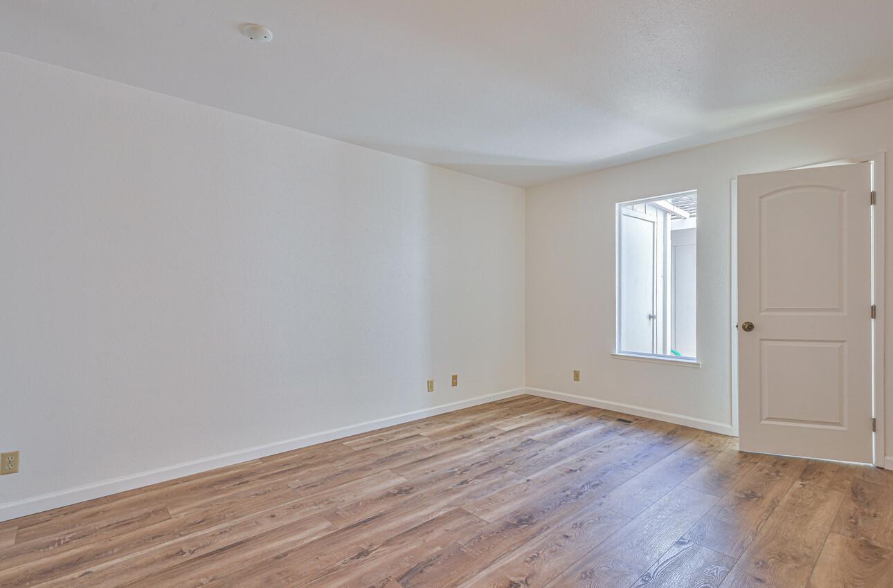 3850 Rio Road, Unit 51 Carmel, CA 93923 - Photo 11 of 24 wooden floor in an empty room