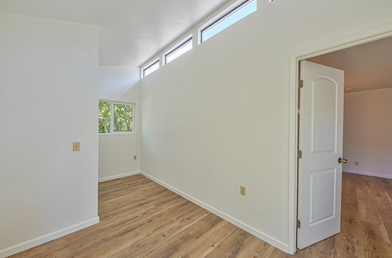 3850 Rio Road, Unit 51 Carmel, CA 93923 - Photo 14 of 24 wooden floor in an empty room