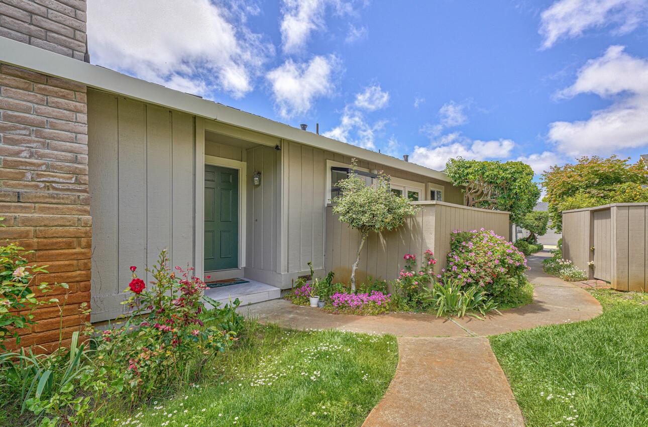 3850 Rio Road, Unit 51 Carmel, CA 93923 - Photo 22 of 24 a front view of a house with garden