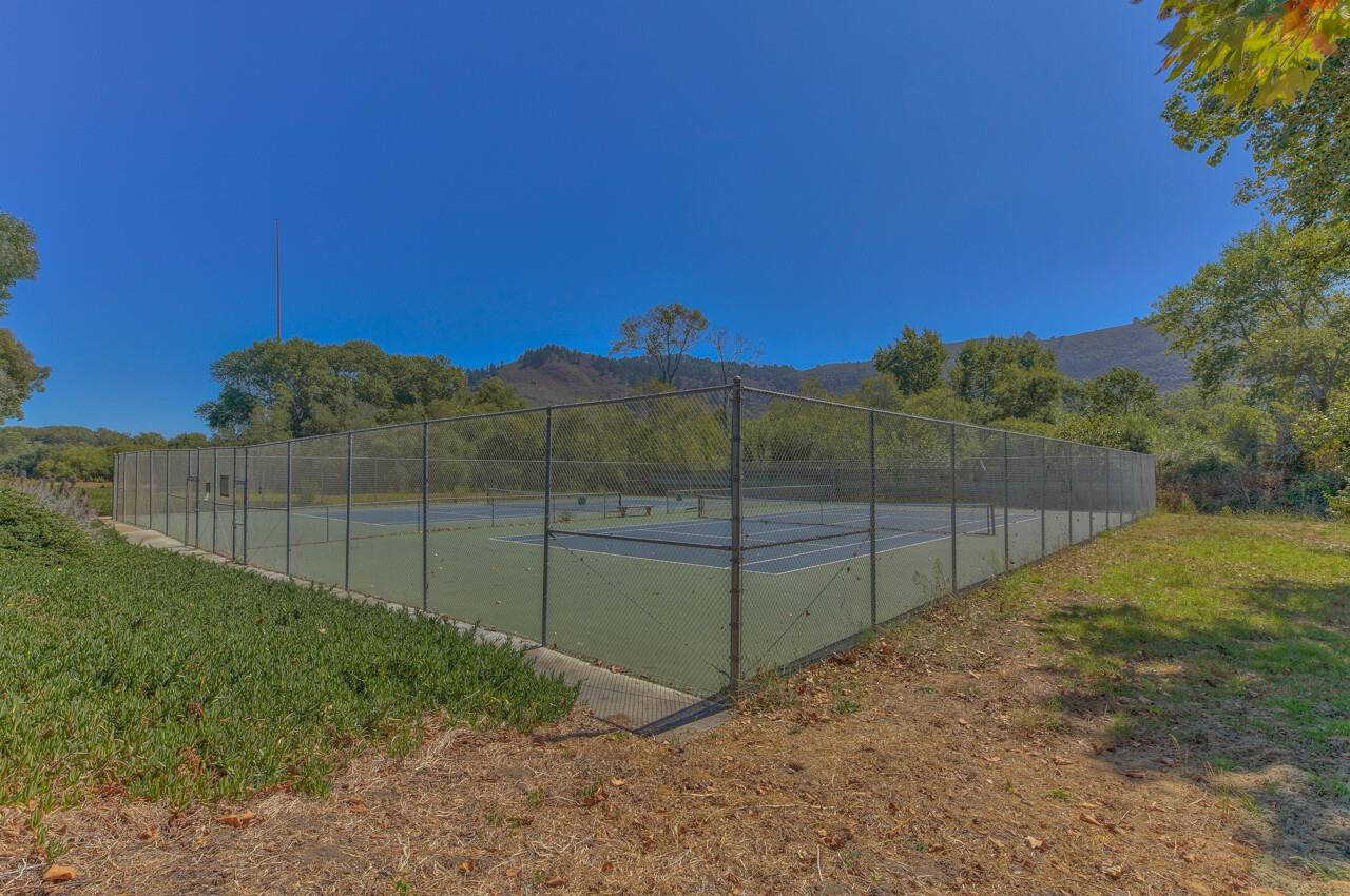 3850 Rio Road, Unit 51 Carmel, CA 93923 - Photo 24 of 24 a view of a backyard