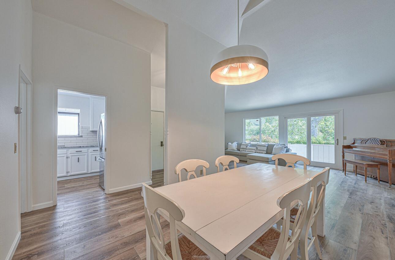 3850 Rio Road, Unit 51 Carmel, CA 93923 - Photo 6 of 24 a view of a dining room with furniture and window