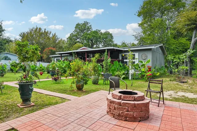 a garden view with a seating space