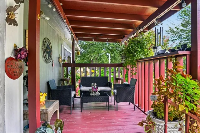a outdoor living space with furniture and a potted plant