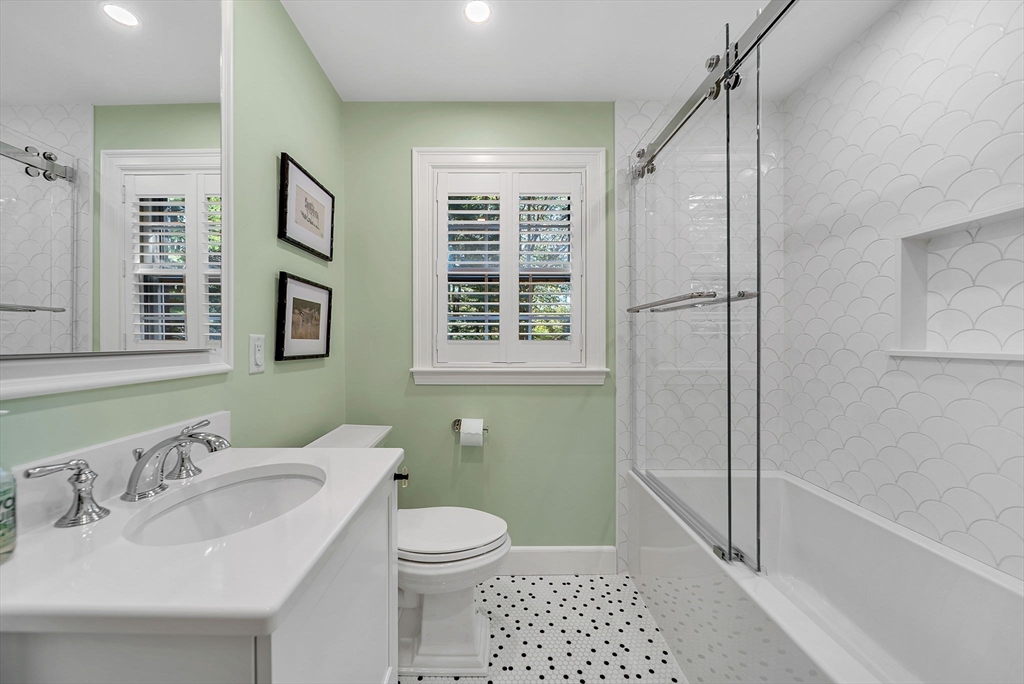 26 Edmunds Road Wellesley, MA 02481 - Photo 24 of 37 a bathroom with a sink toilet and shower