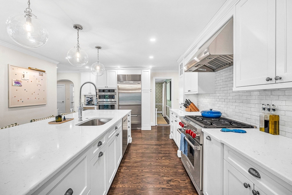 26 Edmunds Road Wellesley, MA 02481 - Photo 6 of 37 a kitchen that has a lot of cabinets in it